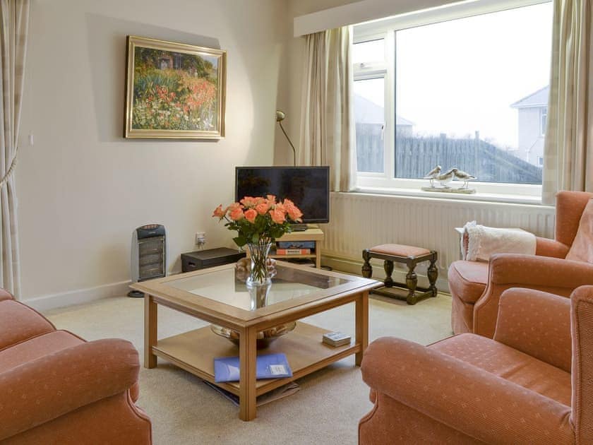 Welcoming living area | Craigneish Bungalow, Trearddur Bay, near Holyhead