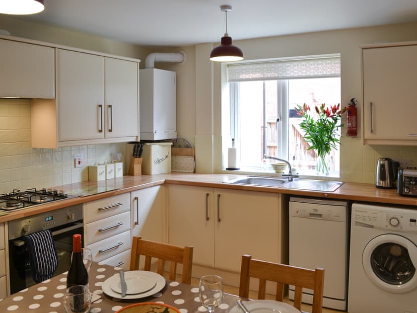 Kitchen and dining area | Old Dairy Court, Sheringham