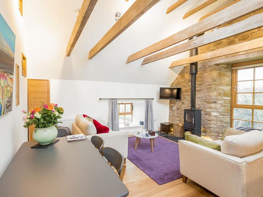 Open plan living space with character and beamed ceiling | The Hayloft, Balerno, near Edinburgh