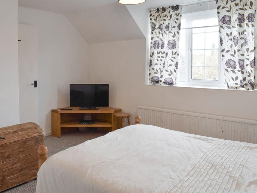 TV in double bedroom | Listers Lodge, Brotton, near Saltburn-by-the-Sea