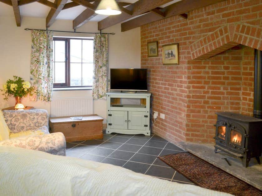 Inviting living room with wood burner | Beckaveans Granary - Beckaveans, Jacobstow, near Bude