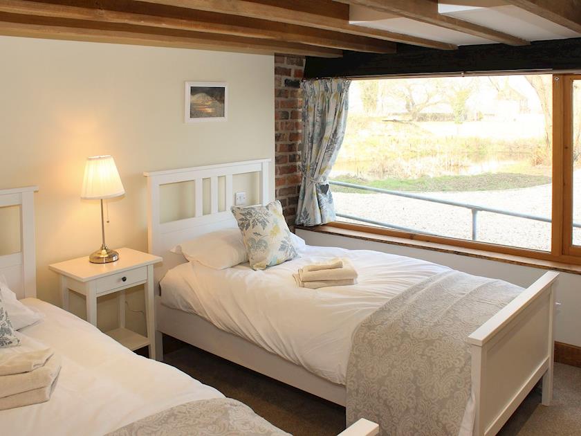 Cosy twin bedroom with beams | The Cart Shed - Corporation Farm Cottages, Tickton, near Beverley