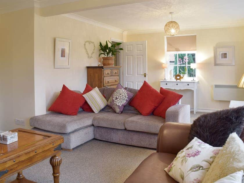 Cosy seating in the living room | Garden Cottage, Wangford, near Southwold