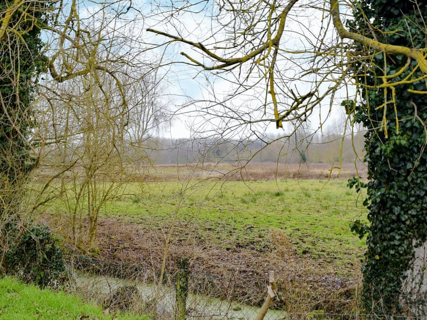 Fenced stream near the property | Garden Cottage, Wangford, near Southwold