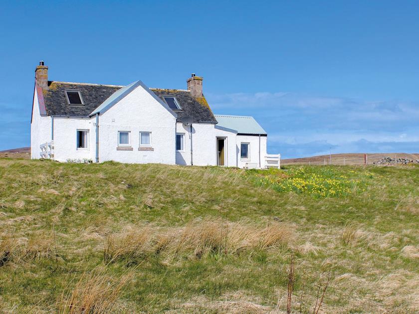 Traditional white-washed stone cottage set on a working croft | Eagle Cottage, near Culkein