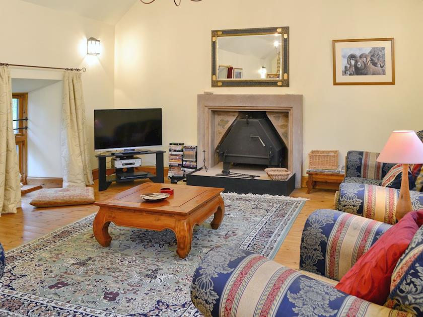 Cosy living room with wood burner | The Granary, Lanton, near Jedburgh