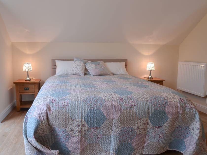 Double bedroom with balcony | Stabal Arthur - Trehwfa Cottages, Bodedern, near Holyhead