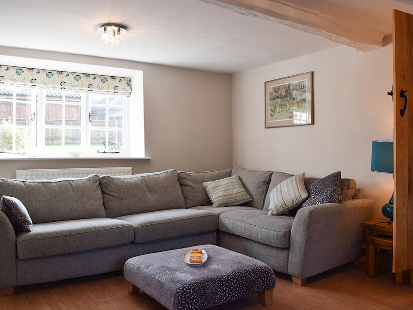 Living room with large corner suite | Dick’s Cottage, Cottesmore, near Oakham