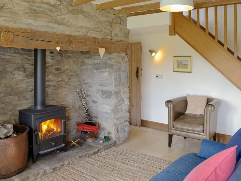 Homely living area with wood burner | Bryn Gwnog, Llanrwst, near Betws-y-Coed