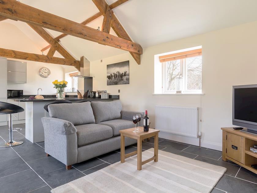 Spacious open plan living space, with beamed ceiling | The Old Dairy, Cam, near Dursley