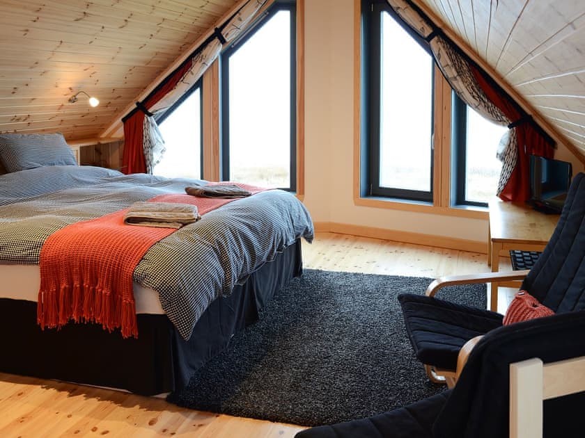 Versatile double bedroom with super kingsize bed comprising two zip and link singles | Fionn Croft Lodge, Melvaig, near Gairloch