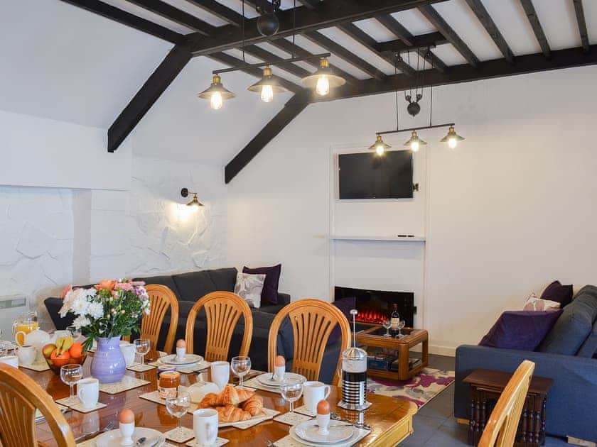 Spacious open plan living area with beamed ceiling | Kingfisher - Maesydderwen Holiday Cottages, near Llandeilo