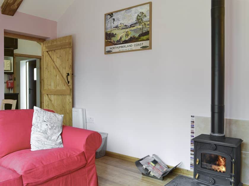 Wood burner in living and dining room | Spindlestone - Wide Sky Cottages, Lowick, near Berwick-on-Tweed