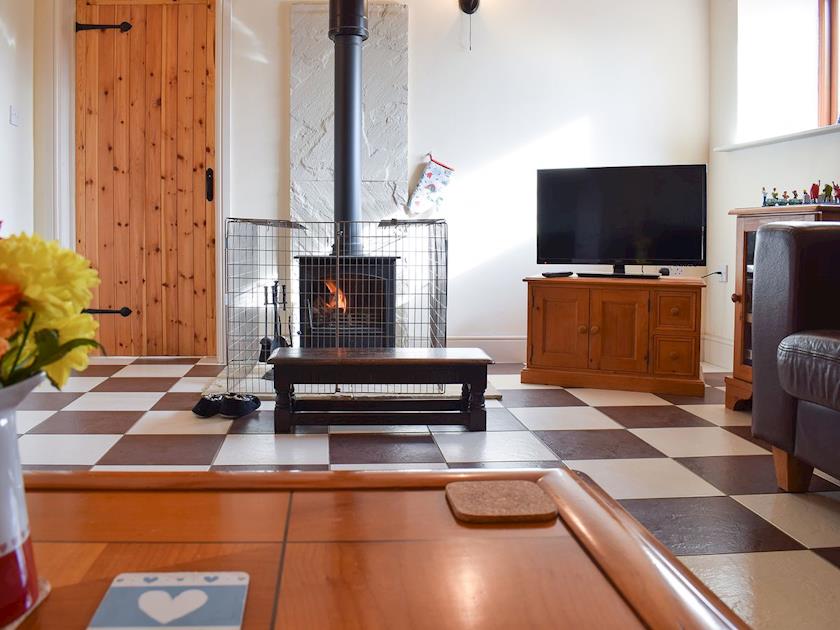 Warm welcoming living area with woodburner | Betty’s Byre - Cleveland View Cottages, Easby Grange, near Great Ayton