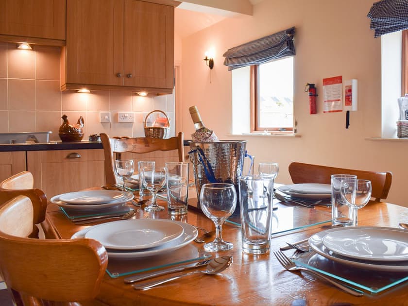 Traditional farmhouse style kitchen dining table | Betty’s Byre - Cleveland View Cottages, Easby Grange, near Great Ayton