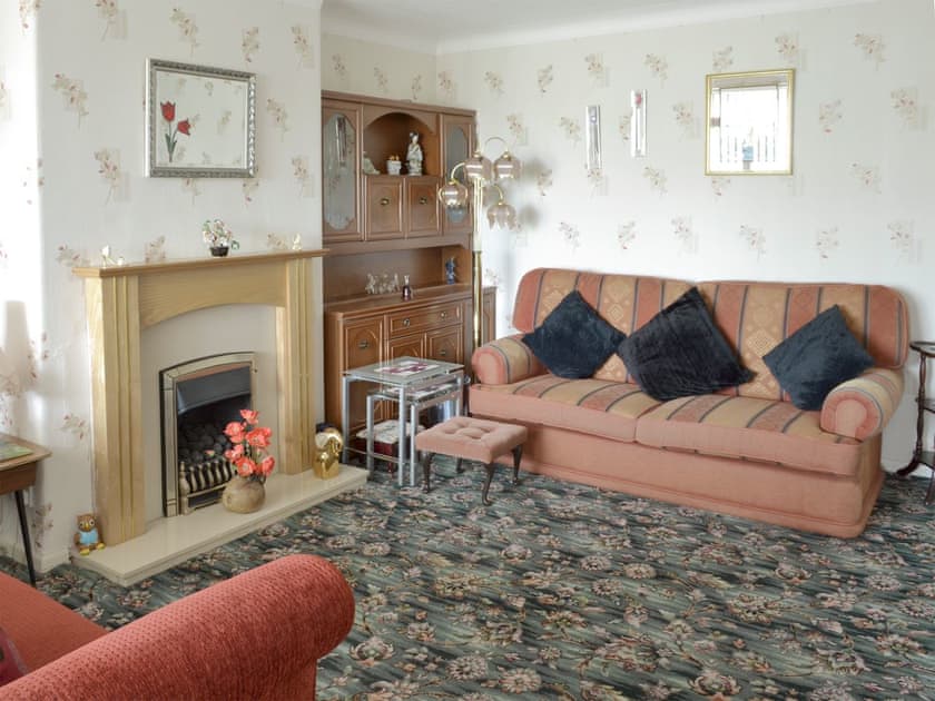 Comfy seating in living room | Rossall Beach Cottage, Rossall, near Thornton-Cleveleys.