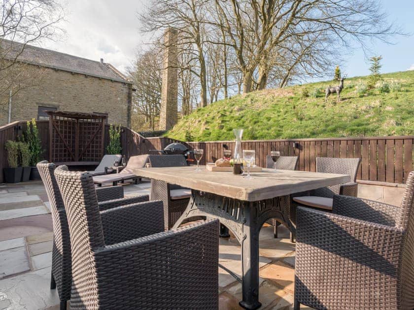 Spacious patio with ample outdoor furniture | Narrowgates Cottage, Barley, near Barrowford