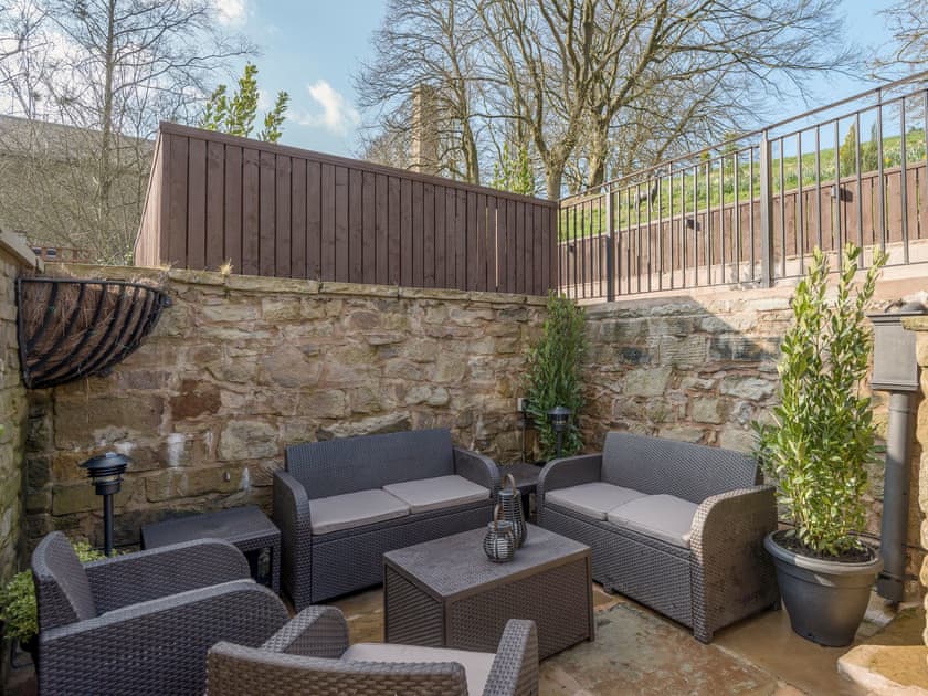 Sheltered area of patio with high quality outdoor furniture | Narrowgates Cottage, Barley, near Barrowford