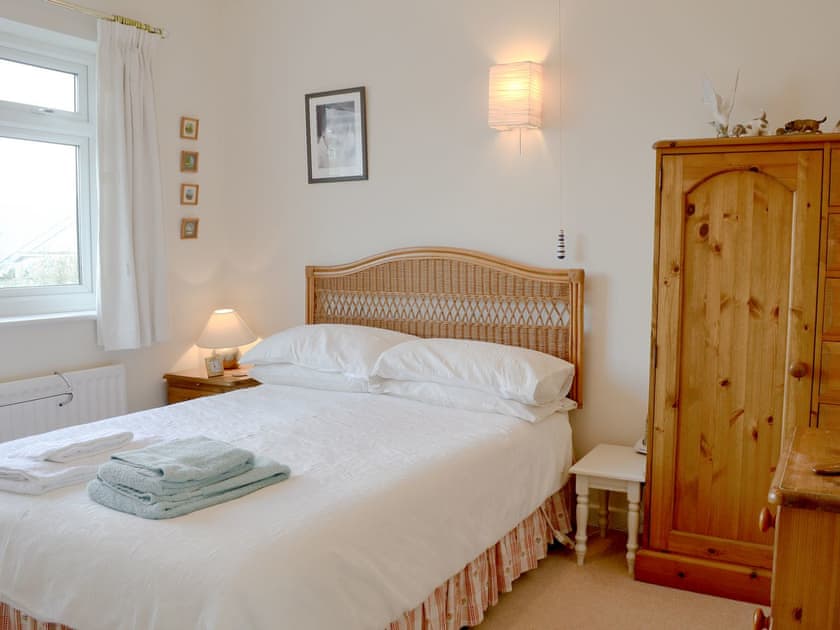 Comfortable double bedroom | Craigneish Bungalow, Trearddur Bay, near Holyhead