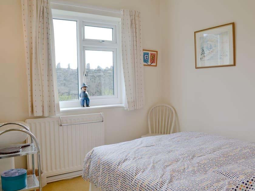 Cosy bedroom with washing facilities | Craigneish Bungalow, Trearddur Bay, near Holyhead