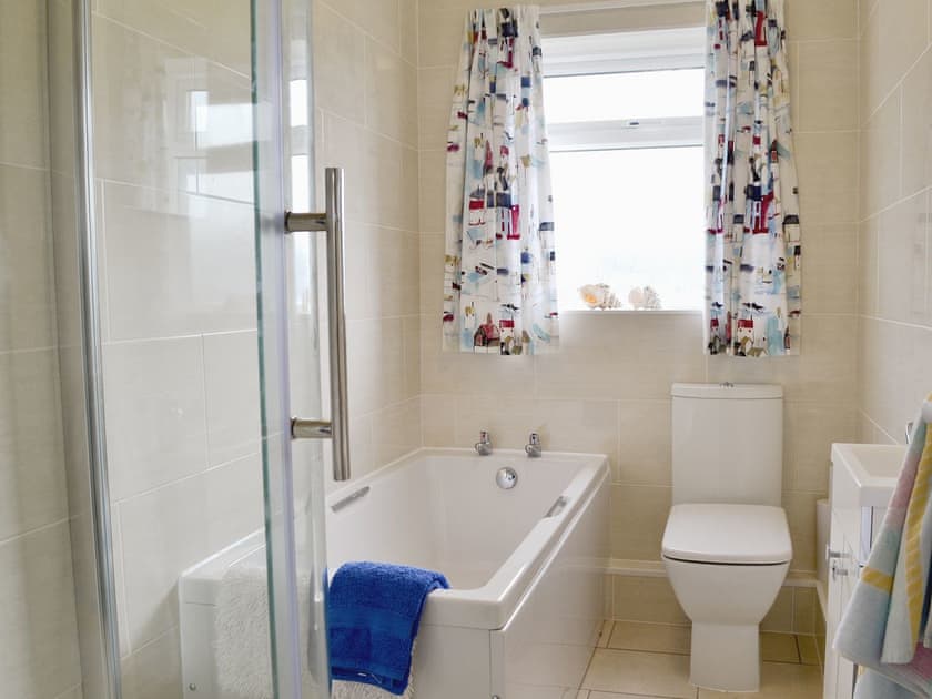 Tiled bathroom | Craigneish Bungalow, Trearddur Bay, near Holyhead