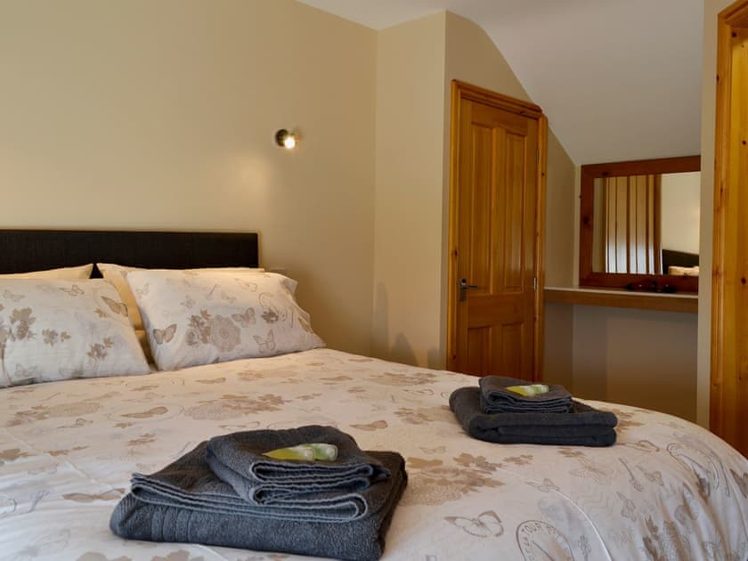 Double bedroom with en-suite shower room | Llain Gam, Llaneilian, near Amlwch