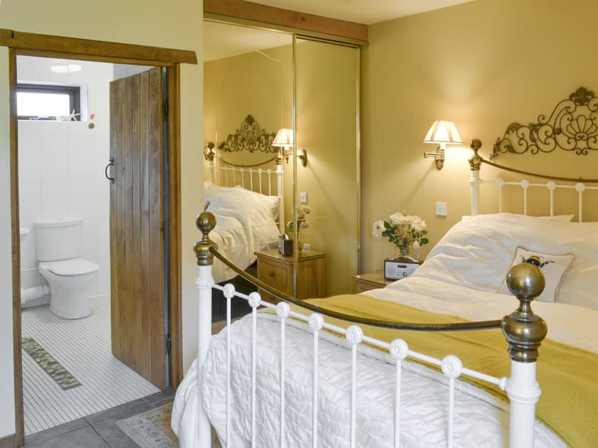 Access to shared wet-room from double bedroom | Riverside Cottage, Old Costessey