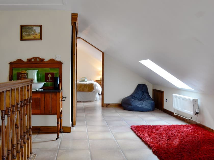 Landing with sitting/reading area | Ty Hir - Bwlchgwyn Equestrian Holidays, Arthog, near Fairbourne