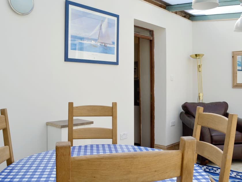 Dining area and additional seating within conservatory area | Mill Street, Drummore, near Stranraer