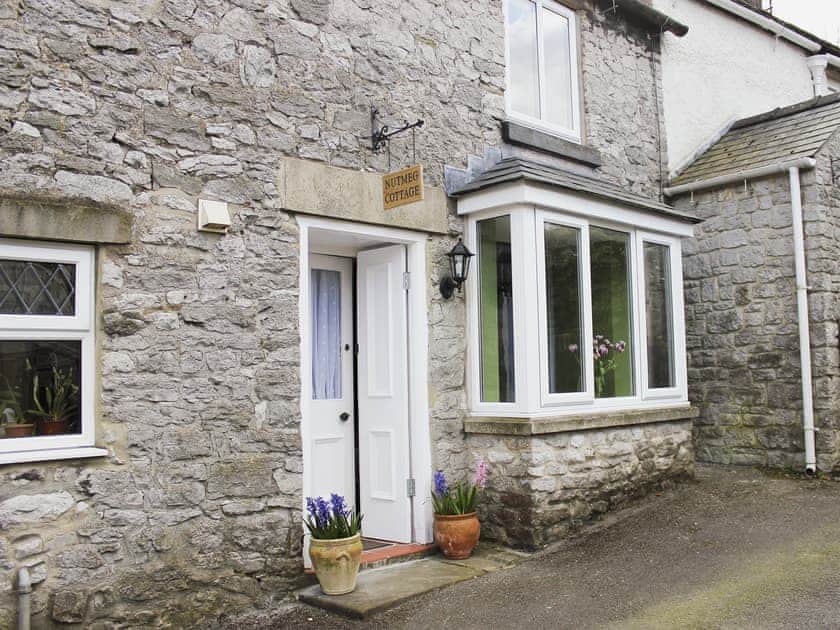 Stone-built, traditional terraced cottage  | Nutmeg Cottage, Tideswell, near Buxton