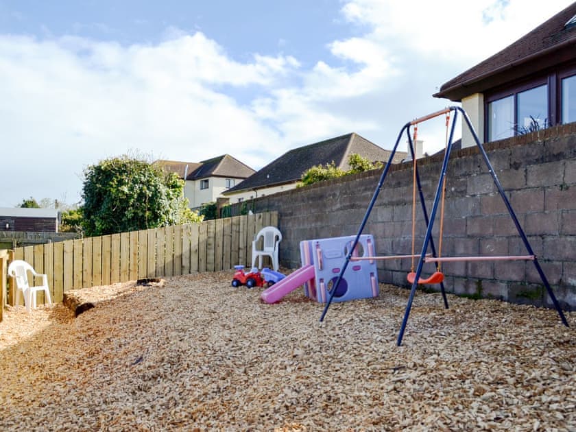 Children’s play area in the garden | Park View Cottage, Stranraer