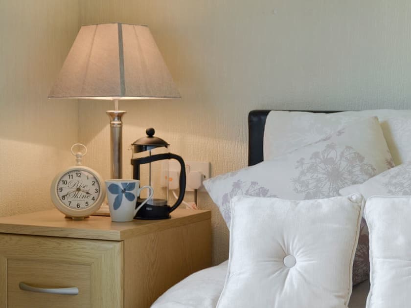 Restful double bedroom | Willow - Thornbury Holiday Park, Woodacott, near Holsworthy
