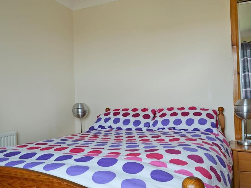 Comfortable double bedroom | Bute Cottage, Daliburgh, South Uist