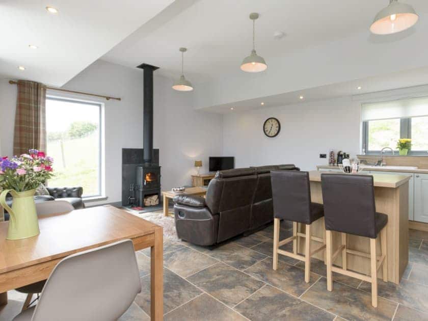 Stylish dining, kitchen and living area | Quiraing - Brogaig Cottages, Brogaig, near Staffin
