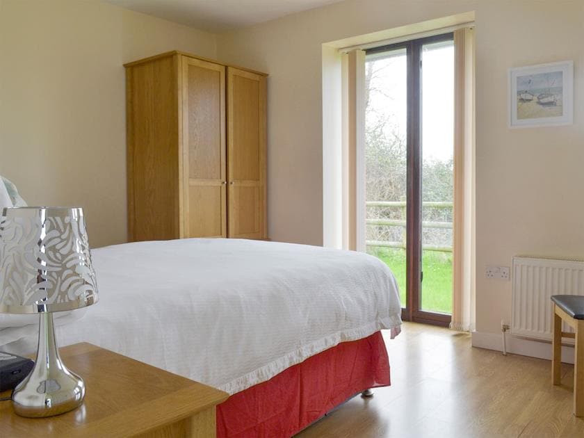 Ample storage within double bedroom | Bramley Cottage, Lympsham, near Weston-super-Mare