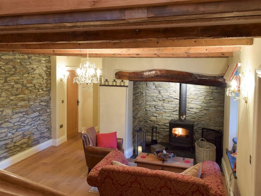 Cosy second living area with exposed wooden beams | Fountain Hill, Eglwyswrw, near Cardigan