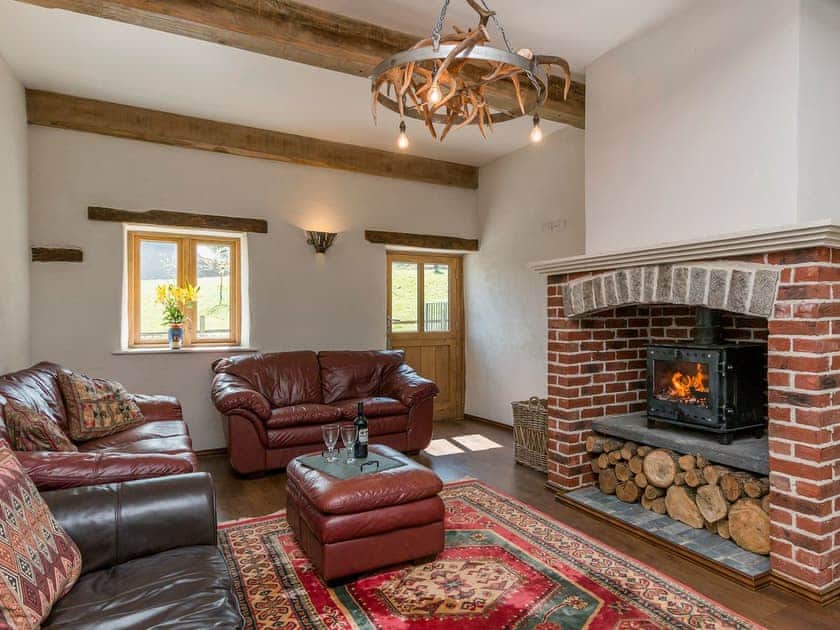Elegant and warm living room with wood burner | The Linhay - East Dunster Deer Farm, Cadeleigh, near Tiverton