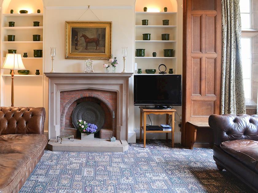 Elegant living room with feature fireplace | Blaithwaite House - Blaithwaite Estate, Waverton, near Wigton
