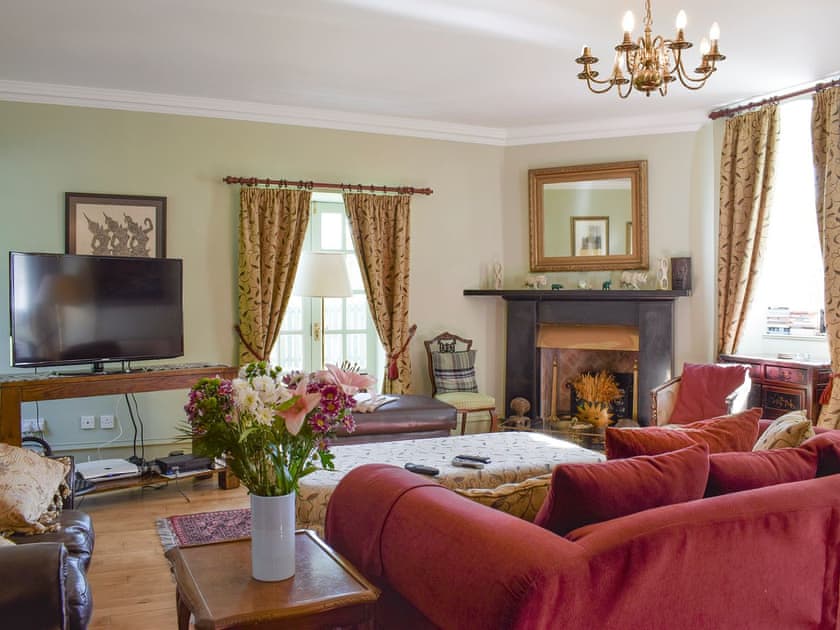 Warm and welcoming living room | The Stables, Pitcairlie, near St Andrews
