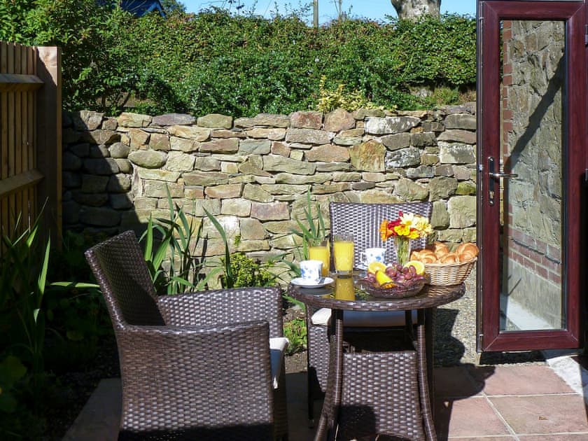 Delightful patio area | Red Kite Cottage, Maesymeillion, near New Quay