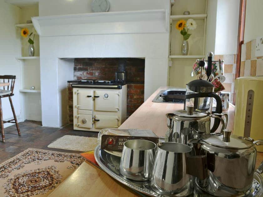 Farmhouse style kitchen with breakfast area | Bettws y Gwynt, Llanbedrgoch, near Benllech