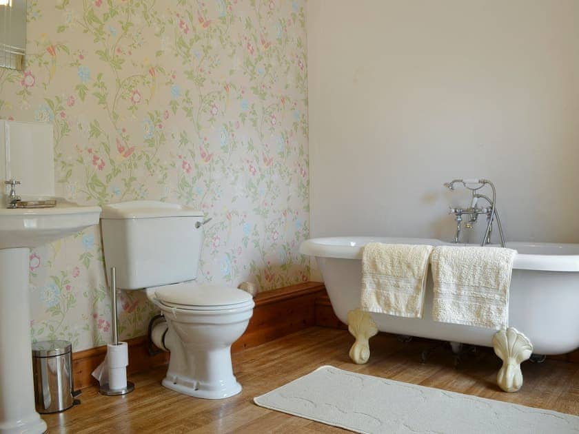 Relaxing bathroom with roll-top bath  | Bettws y Gwynt, Llanbedrgoch, near Benllech