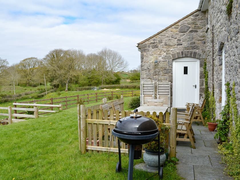 Patio, bar-b-q area | Hersedd Barns, Hendra, near Mold