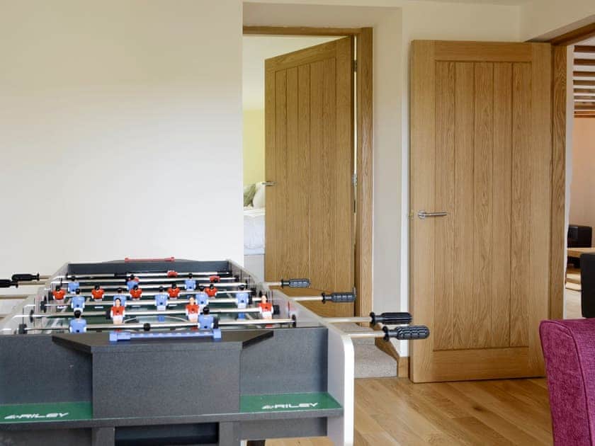 Useful games room | Llofft Storws - Bronallt Barns, Llanynghenedl, near Holyhead