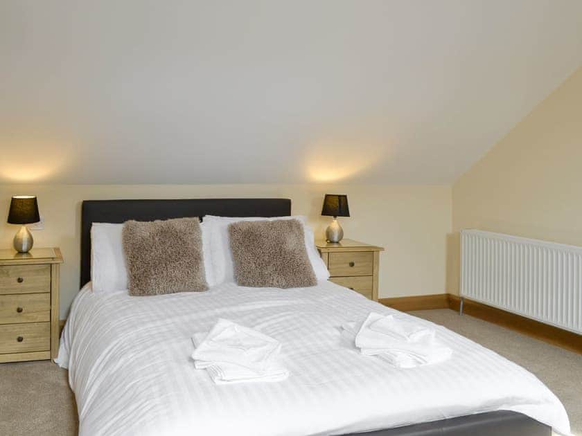 Relaxing third double bedroom | Llofft Storws - Bronallt Barns, Llanynghenedl, near Holyhead