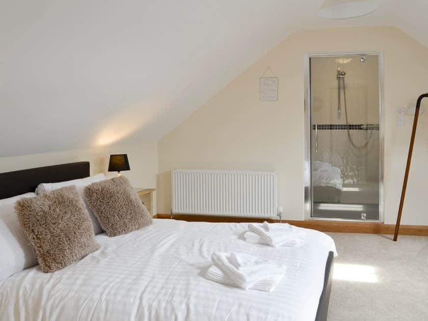 Third double bedroom with shower cubicle | Llofft Storws - Bronallt Barns, Llanynghenedl, near Holyhead