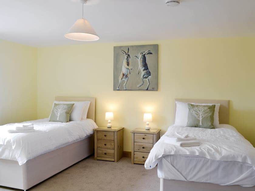 Good-sized twin bedroom | Llofft Storws - Bronallt Barns, Llanynghenedl, near Holyhead