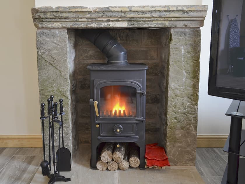 Brilliant wood burner in the living area | Booth Farm Cottage - Booth Farm, Buxton