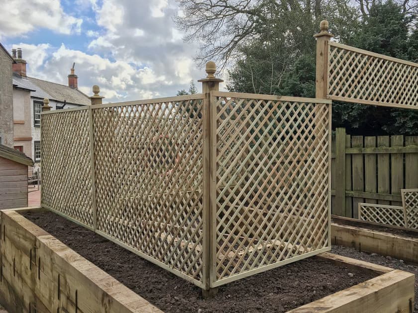 Charming secluded area in the garden | The Moat House, Annan