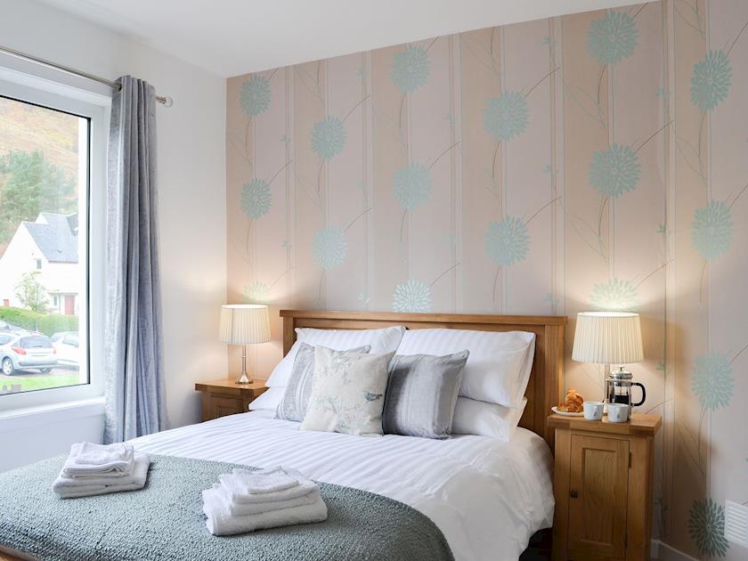 Warm and inviting double bedroom | Rocky Mountain View, Glencoe